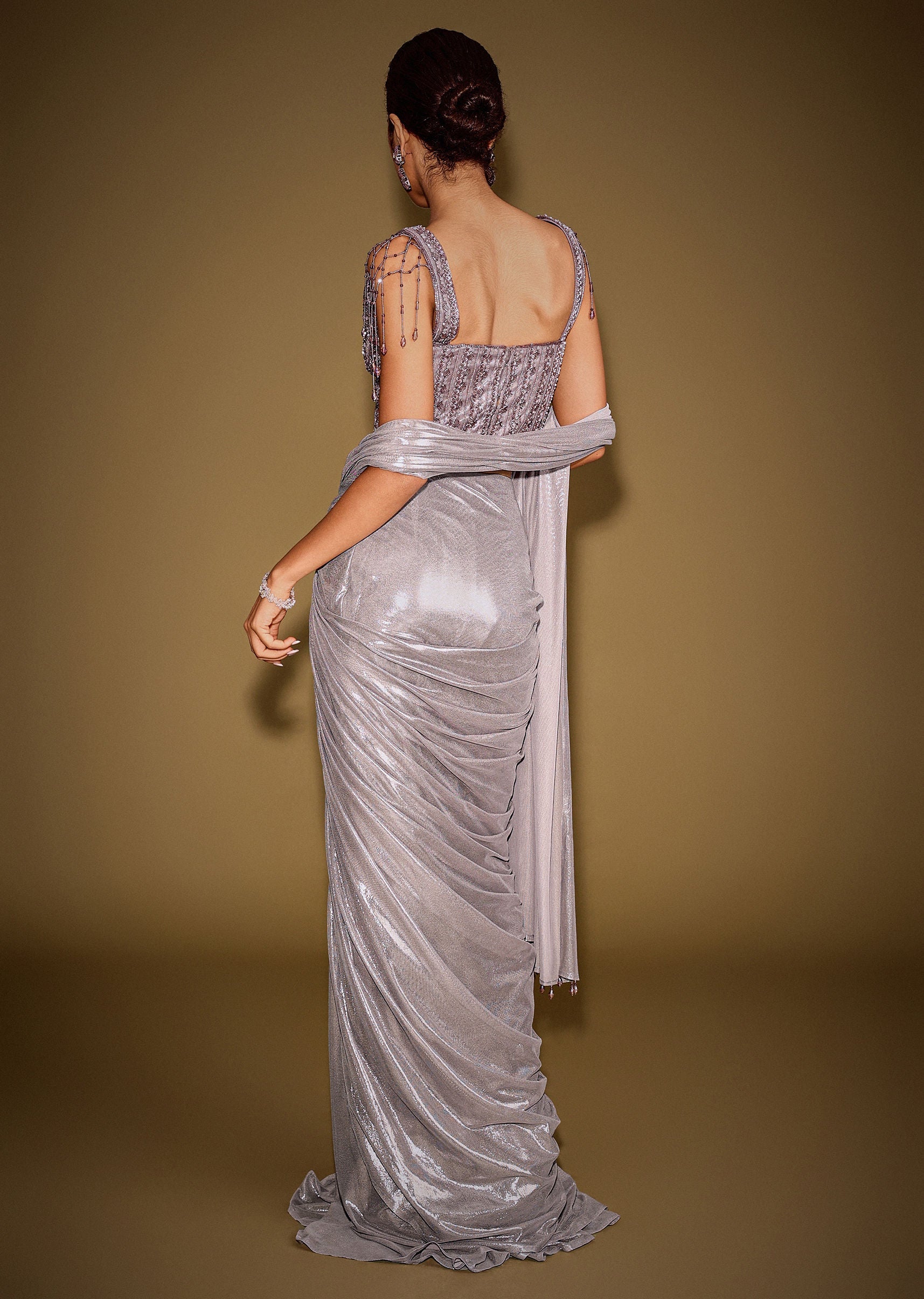 Grey Embellished Corset Blouse With Draped Saree And Tassel Detailing