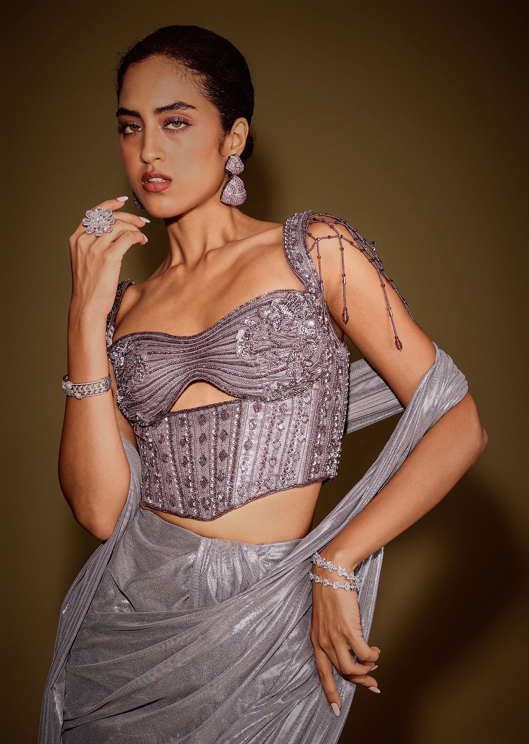 Grey Embellished Corset Blouse With Draped Saree And Tassel Detailing